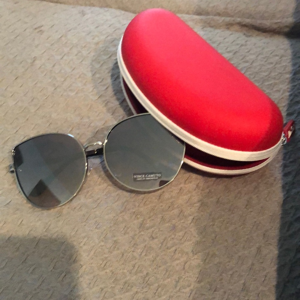 Vince Camuto sunnies.